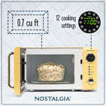 Nostalgia Retro 0.7 Cubic Foot Countertop Microwave, Yellow (NRMO7YW6A)