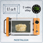Nostalgia Retro 0.7 Cubic Foot Countertop Microwave, Orange (NRMO7OR6A)