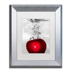 Trademark Fine Art ''Red Apple Splash'' by Roderick Stevens 11" x 14" White Matted Silver Frame (RS012-S1114MF)