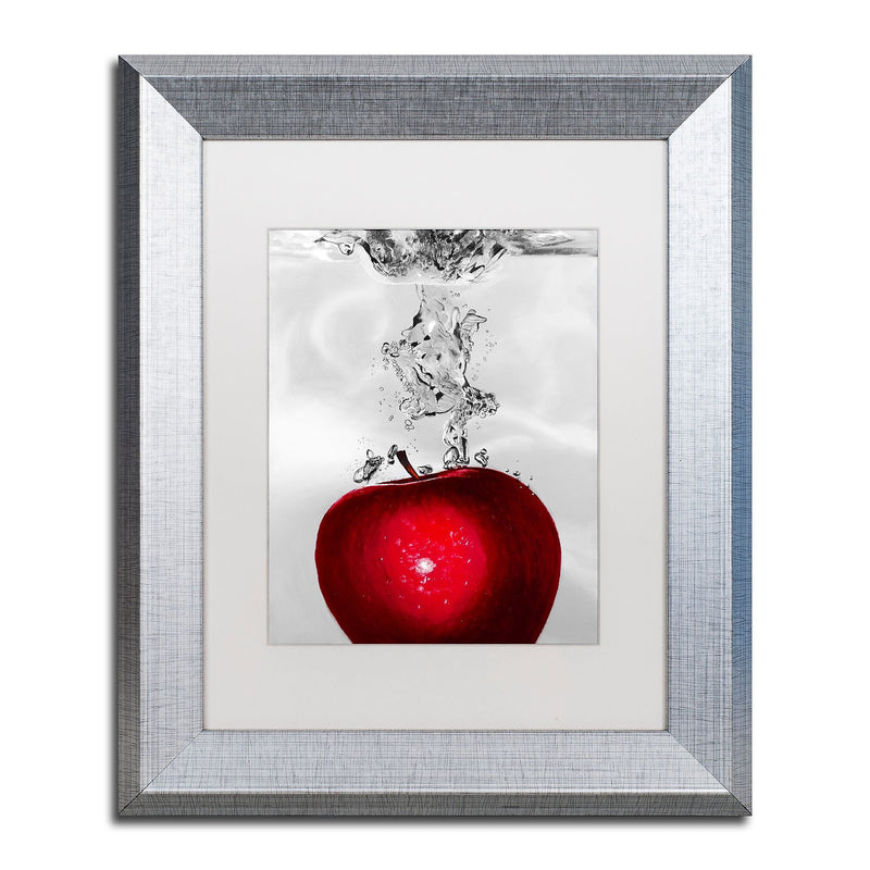 Trademark Fine Art ''Red Apple Splash'' by Roderick Stevens 11" x 14" White Matted Silver Frame (RS012-S1114MF)