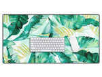 DENY Designs Anti-Slip Polyester Desk Pad, 15.5" x 31.5", Banana Leaf II (68621-DSKMAT)